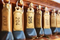 hotel keys with room numbers hunging at reception hotel keys with room numbers hunging at reception
