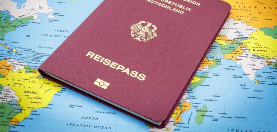 German Passport on a world map