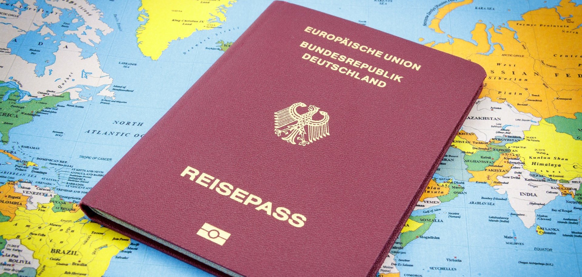 German Passport on a world map